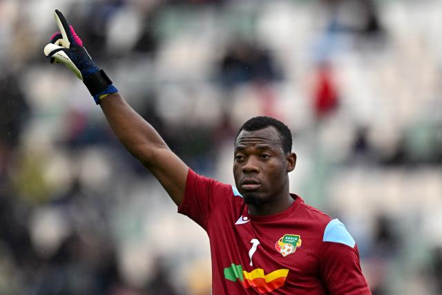 Benin's goalkeeper #01 Marcel Dandjinou reacts during the Africa Cup of Nations (CAN) Group D football match between Benin and Botswana at Rabat Olympic Stadium in Rabat on December 27, 2025. (Photo by Paul ELLIS / AFP)