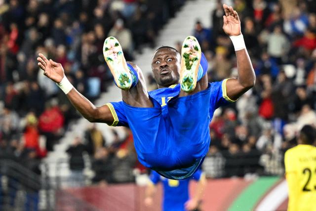 Tanzania's forward #12 Simon Msuva celebrates his goal during the Africa Cup of Nations (CAN) Group C football match between Uganda and Tanzania at Al Medina Stadium in Rabat on December 27, 2025. (Photo by SEBASTIEN BOZON / AFP)