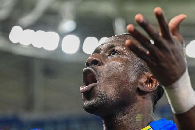 Tanzania's forward #12 Simon Msuva celebrates his goal during the Africa Cup of Nations (CAN) Group C football match between Uganda and Tanzania at Al Medina Stadium in Rabat on December 27, 2025. (Photo by SEBASTIEN BOZON / AFP)