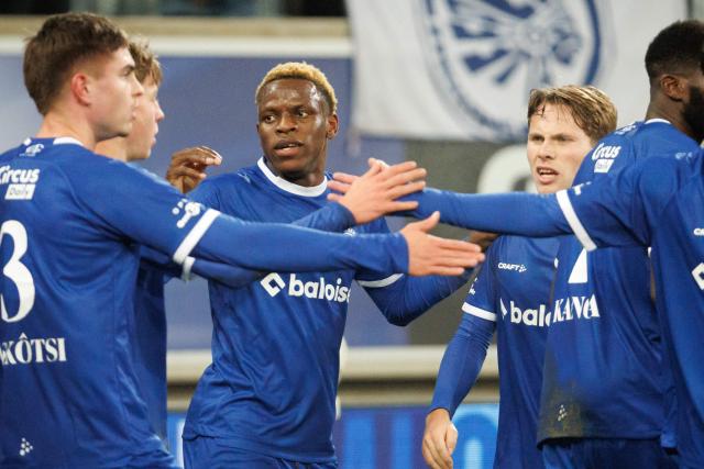 KAA Gent's Ivorian forward #45 Hyllarion Goore (C) celebrates with teammates after scoring Gent's first goal during the Belgian "Pro League" First Division football match between KAA Gent and KVC Westerlo at the Ghelamco Arena in Ghent on December 27, 2025. (Photo by KURT DESPLENTER / Belga / AFP) / Belgium OUT