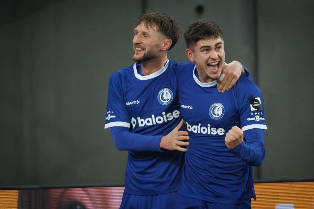 KAA Gent's Estonian defender #03 Maksim Paskotsi (R) celebrates after scoring Gent's second goal during the Belgian "Pro League" First Division football match between KAA Gent and KVC Westerlo at the Ghelamco Arena in Ghent on December 27, 2025. Gent's Maksim Paskotsi (Photo by KURT DESPLENTER / Belga / AFP) / Belgium OUT