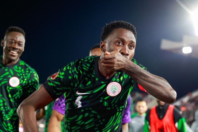 TOPSHOT - Nigeria's midfielder #04 Wilfred Ndidi celebrates his goal during the Africa Cup of Nations (CAN) Group C football match between Nigeria and Tunisia at Fez Stadium in Fez on December 27, 2025. (Photo by Abdel Majid BZIOUAT / AFP)