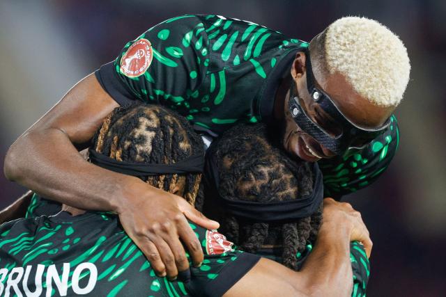 Nigeria's forward #09 Victor Osimhen celebrates the third goal of his team during the Africa Cup of Nations (CAN) Group C football match between Nigeria and Tunisia at Fez Stadium in Fez on December 27, 2025. (Photo by Abdel Majid BZIOUAT / AFP)