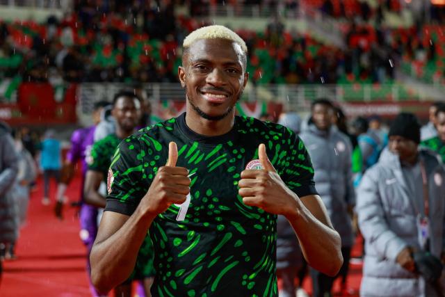 Nigeria's forward #09 Victor Osimhen celebrates after the Africa Cup of Nations (CAN) Group C football match between Nigeria and Tunisia at Fez Stadium in Fez on December 27, 2025. (Photo by Abdel Majid BZIOUAT / AFP)