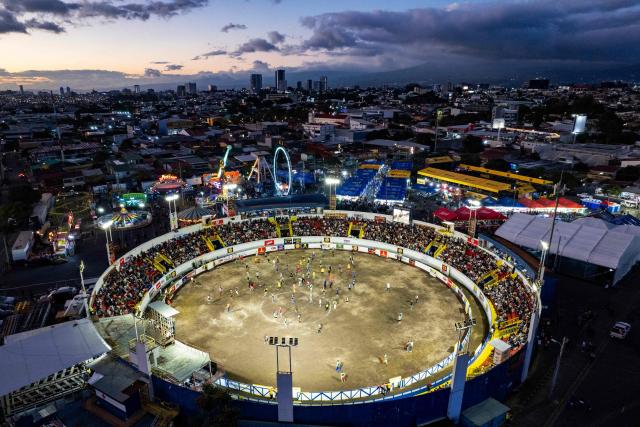 This aerial view shows the Zapote bullring during the 'Toros a la Tica' (Tico-style bullfighting) festival in San Jose on December 27, 2025. (Photo by Ezequiel BECERRA / AFP)