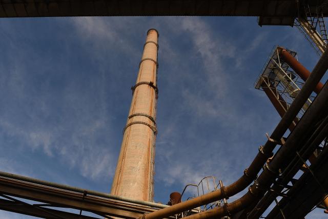 (FILES) This photo shows France's largest biomass-fired power plant in Gardanne, near Aix-en-Provence, southern France on February 3, 2016. After years of ups and downs, the 297-meter chimney of the Provence Thermal Power Plant (the Gardanne power plant), the tallest in France, has recently started smoking again. A sign of hope for the company GazelEnergie, a subsidiary of the EPH group, owner of the site since 2019 which is forced to definitively turn the page on coal in favour of biomass. (Photo by BORIS HORVAT / AFP)