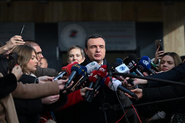 Kosovo's acting Prime Minister and leader of the Vetevendosje Movement (LVV) Albin Kurti addresses the press after casting his vote at a polling station in Pristina on December 28, 2025. Kosovo voters head to the polls on December 28, 2025 for snap parliamentary elections, hoping to end ten months of political deadlock and crisis. (Photo by Armend NIMANI / AFP)