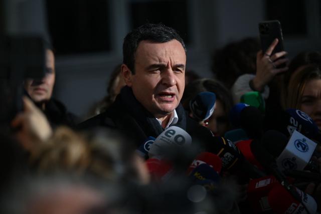 Kosovo's acting Prime Minister and leader of the Vetevendosje Movement (LVV) Albin Kurti addresses the press after casting his vote at a polling station in Pristina on December 28, 2025. Kosovo voters head to the polls on December 28, 2025 for snap parliamentary elections, hoping to end ten months of political deadlock and crisis. (Photo by Armend NIMANI / AFP)