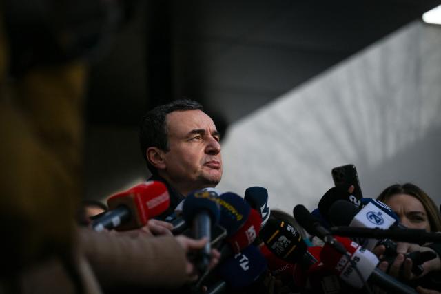 Kosovo's acting Prime Minister and leader of the Vetevendosje Movement (LVV) Albin Kurti addresses the press after casting his vote at a polling station in Pristina on December 28, 2025. Kosovo voters head to the polls on December 28, 2025 for snap parliamentary elections, hoping to end ten months of political deadlock and crisis. (Photo by Armend NIMANI / AFP)