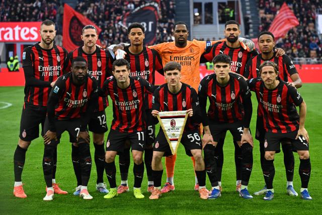 AC Milan's players pose for a team photo ahead of the Italian Serie A football match between AC Milan and Hellas Verona at the San Siro stadium in Milan, northern Italy, on December 28, 2025. (Photo by Piero CRUCIATTI / AFP)