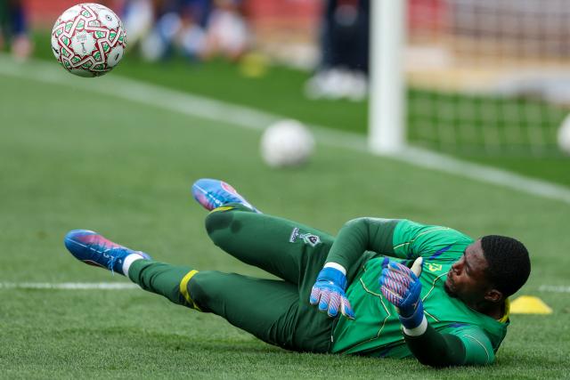 Gabon's goalkeeper #01 Anse Ngoubi Demba warms up prior the Africa Cup of Nations (CAN) Group F football match between Gabon and Mozambique at Grand Stadium in Agadir on December 28, 2025. (Photo by FRANCK FIFE / AFP)
