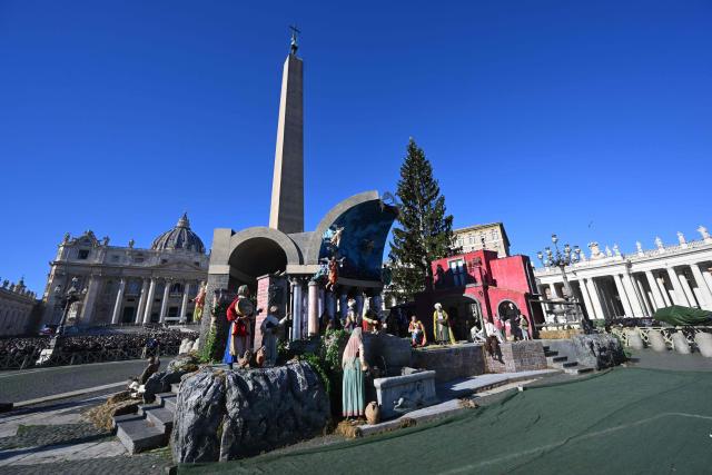 This photograph shows a Nativity scene displayed in St. Peter's square during the Angelus prayer at The Vatican on December 28, 2025. (Photo by Andreas SOLARO / AFP)