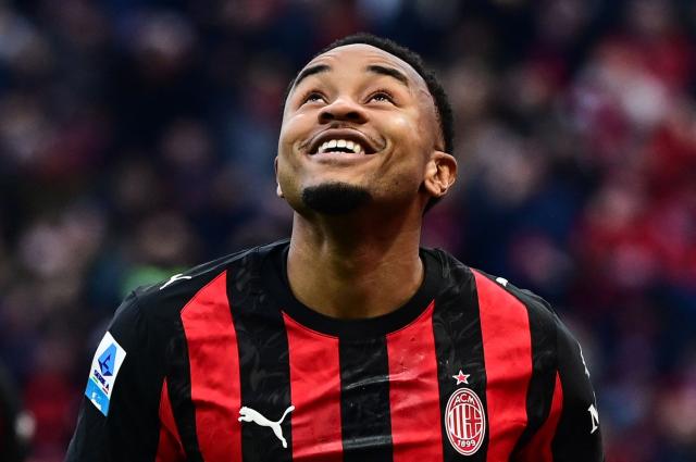 AC Milan's French forward #18 Christopher Nkunku celebrates after scoring his team second goal during the Italian Serie A football match between AC Milan and Hellas Verona at the San Siro stadium in Milan, northern Italy, on December 28, 2025. (Photo by Piero CRUCIATTI / AFP)