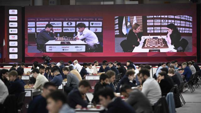 Chess players compete in the 11th round of the FIDE World Rapid and Blitz Championships 2025 at the Sports and Events Complex, at Qatar University in Doha on December 28, 2025. (Photo by MAHMUD HAMS / AFP)