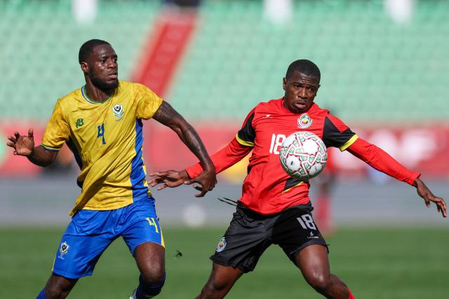 04 Gabon's defender #04 Alex Moucketou-Moussounda and Mozambique's midfielder #18 Gildo Vilanculos vie during the Africa Cup of Nations (CAN) Group F football match between Gabon and Mozambique at Grand Stadium in Agadir on December 28, 2025. (Photo by FRANCK FIFE / AFP)