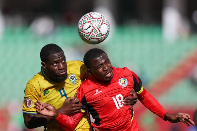 04 Gabon's defender #04 Alex Moucketou-Moussounda and Mozambique's midfielder #18 Gildo Vilanculos vie during the Africa Cup of Nations (CAN) Group F football match between Gabon and Mozambique at Grand Stadium in Agadir on December 28, 2025. (Photo by FRANCK FIFE / AFP)