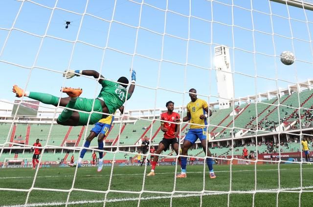 Gabon's goalkeeper #23 Loyce Mbaba concedes a goal during the Africa Cup of Nations (CAN) Group F football match between Gabon and Mozambique at Grand Stadium in Agadir on December 28, 2025. (Photo by FRANCK FIFE / AFP)