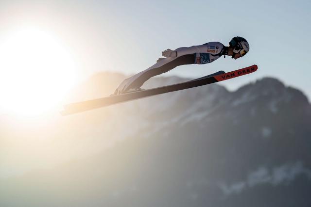 Slovenia's Rok Oblak soars through the air during the training for the Men's Individual Large Hill HS137 event of the FIS Ski Jumping World Cup, the first leg of the Four Hills Tournament, in Oberstdorf, southern Germany on December 28, 2025. (Photo by Philipp Guelland / AFP)