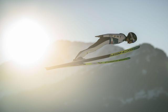 Japan's Sakutaro Kobayashi soars through the air during the training for the Men's Individual Large Hill HS137 event of the FIS Ski Jumping World Cup, the first leg of the Four Hills Tournament, in Oberstdorf, southern Germany on December 28, 2025. (Photo by Philipp Guelland / AFP)