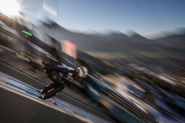 Bulgaria's Vladimir Zografski competes during the training for the Men's Individual Large Hill HS137 event of the FIS Ski Jumping World Cup, the first leg of the Four Hills Tournament, in Oberstdorf, southern Germany on December 28, 2025. (Photo by Philipp Guelland / AFP)