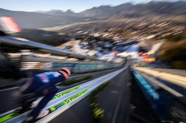 Germany's Pius Paschke competes during the training for the Men's Individual Large Hill HS137 event of the FIS Ski Jumping World Cup, the first leg of the Four Hills Tournament, in Oberstdorf, southern Germany on December 28, 2025. (Photo by Philipp Guelland / AFP)
