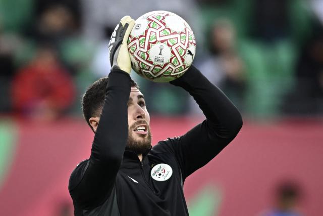 Algeria's goalkeeper #23 Luca Zidane warms-up before the Africa Cup of Nations (CAN) Group E football match between Algeria and Burkino Faso at Moulay Hassan Stadium in Rabat on December 28, 2025. (Photo by Paul ELLIS / AFP)