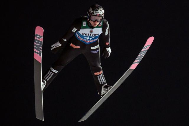 Norway's Marius Lindvik competes during the qualifying for the Men's Individual Large Hill HS137 event of the FIS Ski Jumping World Cup, the first leg of the Four Hills Tournament, in Oberstdorf, southern Germany on December 28, 2025. (Photo by Philipp Guelland / AFP)