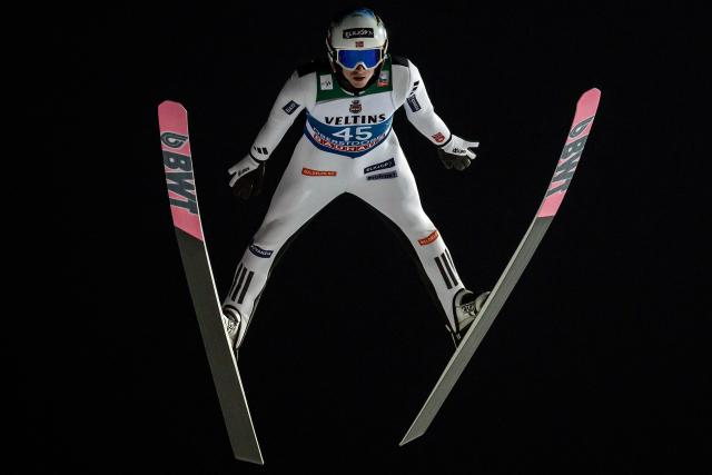 Canada's Arianne Forget competes during the qualifying for the Men's Individual Large Hill HS137 event of the FIS Ski Jumping World Cup, the first leg of the Four Hills Tournament, in Oberstdorf, southern Germany on December 28, 2025. (Photo by Philipp Guelland / AFP)