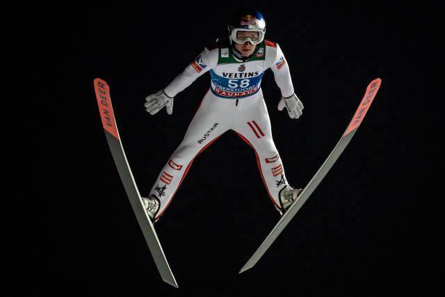 Austria's Daniel Tschofenig competes during the qualifying for the Men's Individual Large Hill HS137 event of the FIS Ski Jumping World Cup, the first leg of the Four Hills Tournament, in Oberstdorf, southern Germany on December 28, 2025. (Photo by Philipp Guelland / AFP)