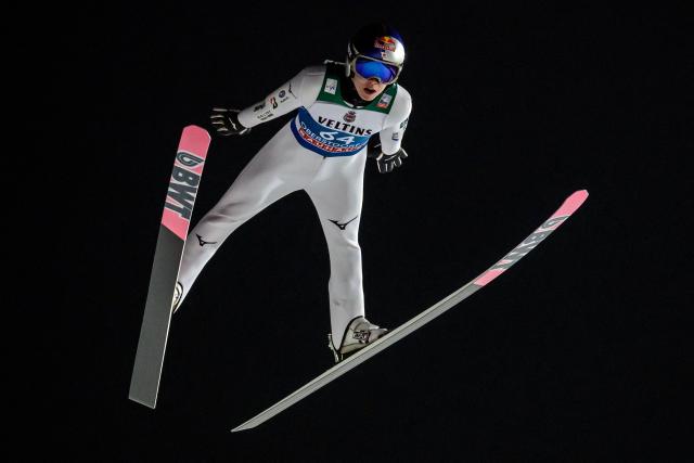 Japan's Ryoyu Kobayashi competes during the qualifying for the Men's Individual Large Hill HS137 event of the FIS Ski Jumping World Cup, the first leg of the Four Hills Tournament, in Oberstdorf, southern Germany on December 28, 2025. (Photo by Philipp Guelland / AFP)
