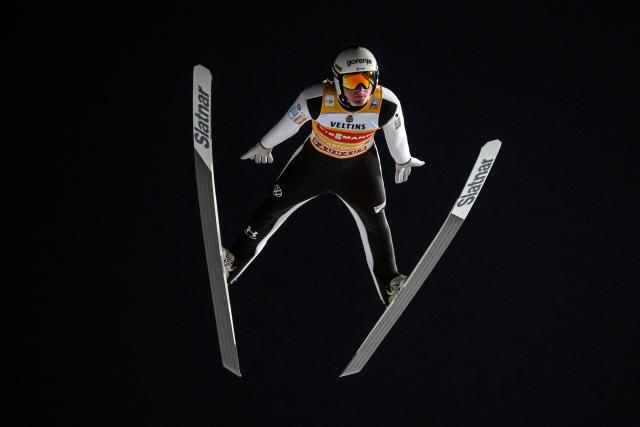 Slovenia's Domen Prevc competes during the qualifying for the Men's Individual Large Hill HS137 event of the FIS Ski Jumping World Cup, the first leg of the Four Hills Tournament, in Oberstdorf, southern Germany on December 28, 2025. (Photo by Philipp Guelland / AFP)
