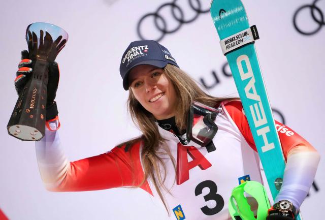 Second placed Switzerland's Camille Rast celebrates on the podium after the Women's Slalom race of the FIS Alpine Ski World Cup in Semmering, Austria on December 28, 2025. (Photo by GEORG HOCHMUTH / APA / AFP) / Austria OUT