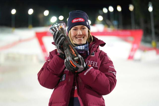 Winner USA's Mikaela Shiffrin celebrates with her trophy after the Women's Slalom race of the FIS Alpine Ski World Cup in Semmering, Austria on December 28, 2025. (Photo by GEORG HOCHMUTH / APA / AFP) / Austria OUT