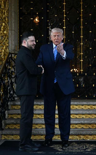 US President Donald Trump welcomes Ukranian President Volodymyr Zelensky at his Mar-a-Lago residence in Palm Beach, Florida, on December 28, 2025. (Photo by Jim WATSON / AFP)