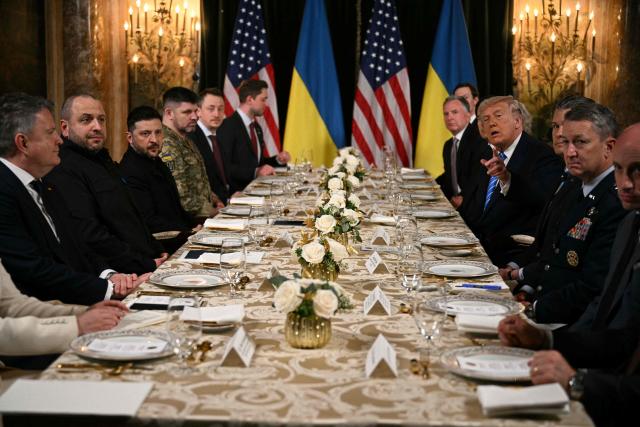 US President Donald Trump meets with Ukranian President Volodymyr Zelensky at his Mar-a-Lago residence in Palm Beach, Florida, on December 28, 2025. (Photo by Jim WATSON / AFP)