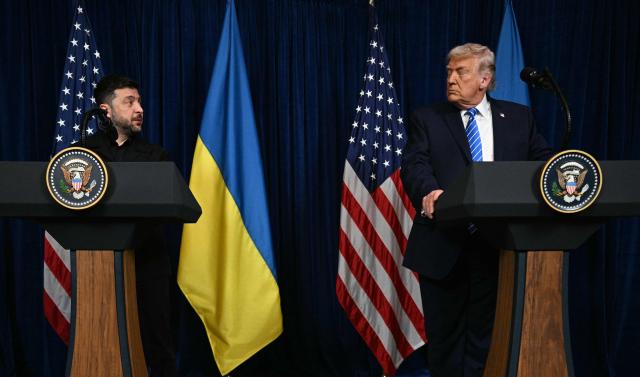 US President Donald Trump and Ukranian President Volodymyr Zelensky hold a press conference following talks at Trump's Mar-a-Lago residence in Palm Beach, Florida, on December 28, 2025. (Photo by Jim WATSON / AFP)