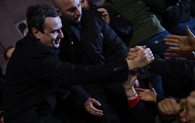 Kosovo’s acting Prime Minister and leader of the Vetevendosje Movement (LVV), Albin Kurti, celebrates election results with supporters in Pristina on December 28, 2025. Preliminary results in Kosovo's parliamentary elections on December 28, suggested that caretaker Prime Minister Albin Kurti's party was nearing 50 percent, potentially ending the country's long-running political deadlock. (Photo by Armend NIMANI / AFP)