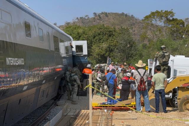 Mexican Army soldiers and Civil Protection members rescued passengers from the Interoceanic train that derailed in the Asuncion Ixtaltepec area on the route to Oaxaca, Mexico on December 28, 2025. (Photo by Rusvel RASGADO / AFP)
