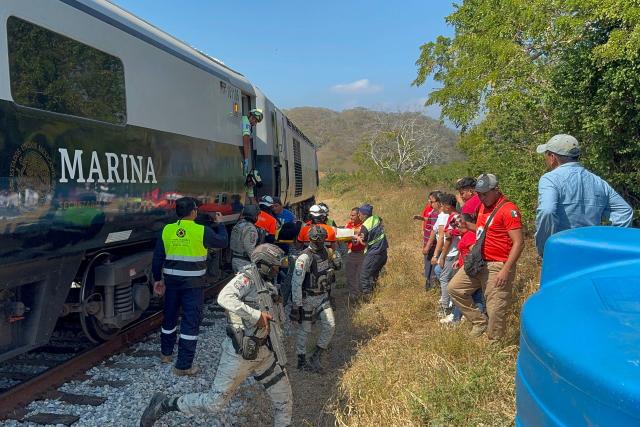 Mexican Army soldiers and Civil Protection members rescued passengers from the Interoceanic train that derailed in the Asuncion Ixtaltepec area on the route to Oaxaca, Mexico on December 28, 2025. (Photo by Rusvel RASGADO / AFP)