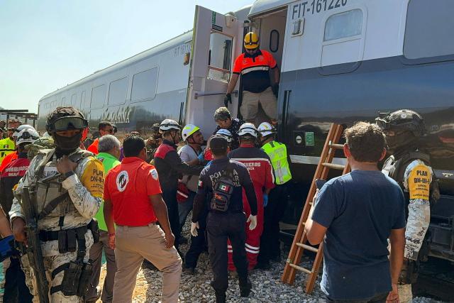 Mexican Army soldiers and Civil Protection members rescued passengers from the Interoceanic train that derailed in the Asuncion Ixtaltepec area on the route to Oaxaca, Mexico on December 28, 2025. (Photo by Rusvel RASGADO / AFP)
