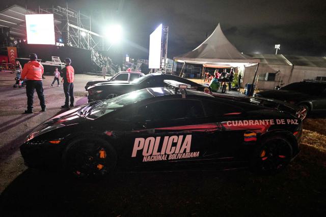 A Bolivarian National Police Lamborghini is pictured during a car exhibition at La Carlota air base in Caracas on December 28, 2025. (Photo by Juan BARRETO / AFP)