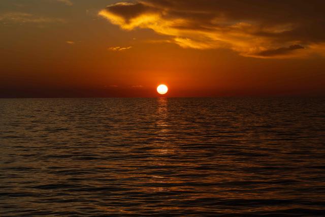 This photograph taken on December 29, 2025 shows the sunrise over the Mediterranean Sea. (Photo by Sameer Al-DOUMY / AFP)