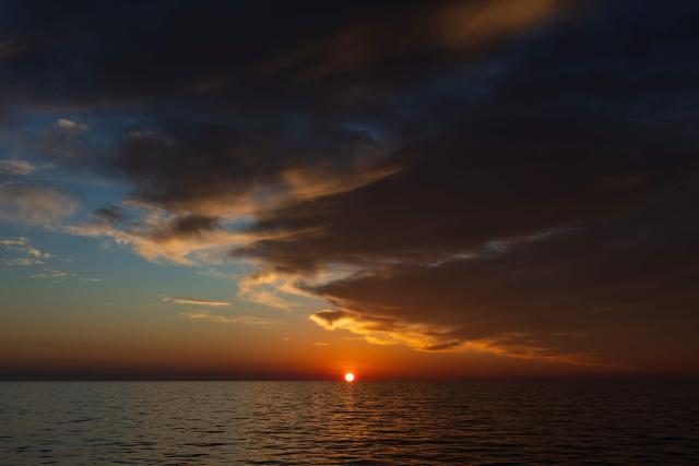 This photograph taken on December 29, 2025 shows the sunrise over the Mediterranean Sea. (Photo by Sameer Al-DOUMY / AFP)