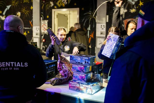 Clients buy fireworks at a sales point in a garden center in 's Gravenlande on December 29, 2025. Traditionally, fireworks sales are permitted on the last three days of the year. (Photo by Lina Selg / ANP / AFP) / Netherlands OUT