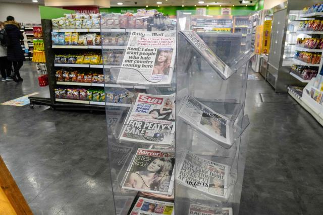 A newsstand is pictured in a shop in London on December 29, 2025, showing British newspapers covered with images of late French film actress Brigitte Bardot. Bardot, a symbol of sexual liberation in the 1950s and 1960s who reinvented herself as an animal rights defender and embraced far-right views, died on December 28 at the age of 91, her foundation said. (Photo by CARLOS JASSO / AFP)