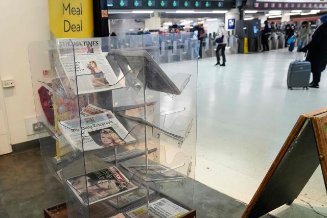 A newsstand is pictured in a shop in London on December 29, 2025, showing British newspapers covered with images of late French film actress Brigitte Bardot. Bardot, a symbol of sexual liberation in the 1950s and 1960s who reinvented herself as an animal rights defender and embraced far-right views, died on December 28 at the age of 91, her foundation said. (Photo by CARLOS JASSO / AFP)