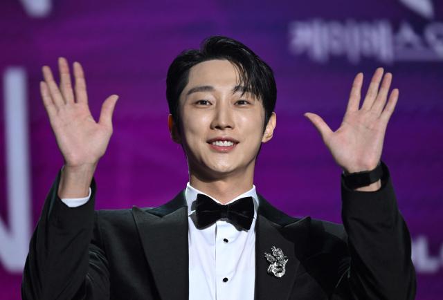South Korean singer and actor Jung Jin-young, known as Jinyoung, poses for a photo call during the 2025 Seoulcon APAN Star Awards for K-Drama at Dongdaemun Design Plaza in Seoul on December 29, 2025. (Photo by Jung Yeon-je / AFP)
