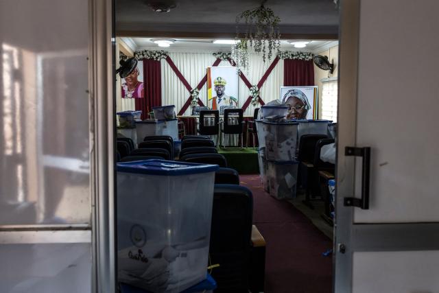 A portrait of Guinea President and presidential candidate Mamady Doumbouya is seen next to ballot boxes full of electoral materials at Kaloum’s city hall in Conakry, on December 29, 2025, the day after voting during Guinea’s presidential election. Initial results in Guinea's presidential election were due on December 29, 2025, officials said, a day after the vote in which junta chief Mamady Doumbouya is seeking to legitimise his rule.
The main opposition leaders were barred from standing and had urged a boycott of the ballot, which comes four years after Doumbouya led a coup to topple Guinea's first freely elected president. (Photo by PATRICK MEINHARDT / AFP)
