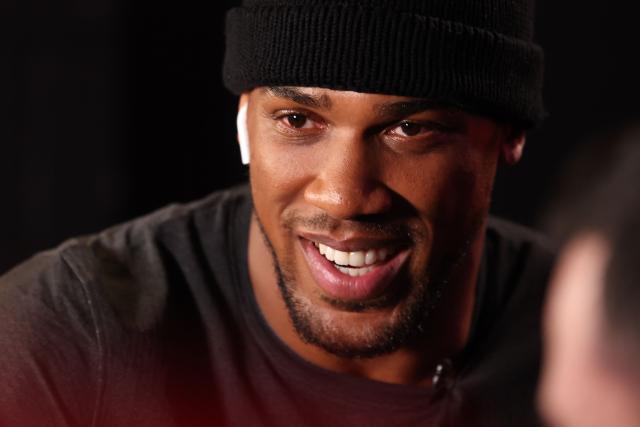 (FILES) British heavyweight boxer Anthony Joshua smiles during a press conference in London on January 15, 2024, ahead of his fight with French-Cameroonian boxer Francis Ngannou in March. Former world heavyweight champion Anthony Joshua was injured in a fatal highway accident that killed two people on December 29, 2025, Nigerian media reported.
Punch newspaper said the crash occurred on the Lagos-Ibadan expressway when the car he was riding in collided with a truck. (Photo by Daniel LEAL / AFP)