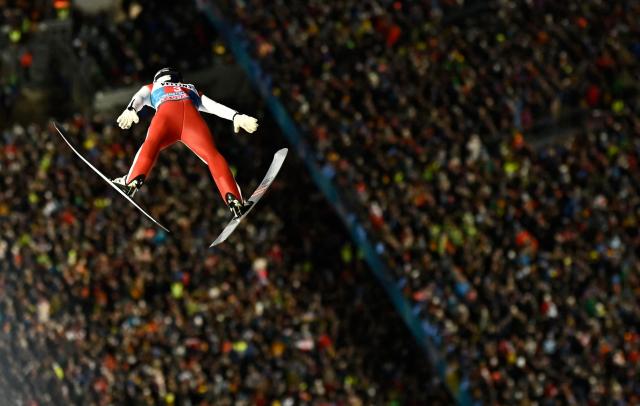 Austria's Daniel Tschofenig competes during the first round of the Men's Individual Large Hill HS137 event of the FIS Ski Jumping World Cup, the first leg of the Four Hills Tournament, in Oberstdorf, southern Germany on December 29, 2025. (Photo by PHILIPP GUELLAND / AFP)